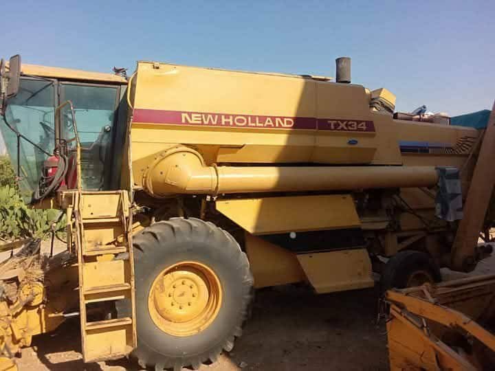 للبيع حصادة نيو هولاند في حماة، هارفستر New Holland TX34 موديل 1991، تواجد حماة، أسعار منافسة للمعدات الزراعية الثقيلة