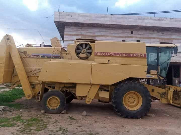للبيع حصادة نيو هولاند في حماة، هارفستر New Holland TX34 موديل 1991، تواجد حماة، أسعار منافسة للمعدات الزراعية الثقيلة