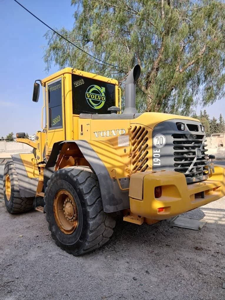 للبيع تركس فولفو في دمشق, لودر VOLVO L90 E كهرباء فحص كامل موديل 2003 بمواصفات 2006 وارد ألمانيا بحالة ممتازة تواجد دمشق, سوق المعدات الثقيلة في سوريا