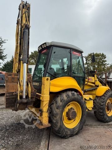 NEW HOLLAND loader for sale, NEW HOLLAND 115, 2012 model, imported from Europe. The best site for selling trucks and heavy equipment in Egypt.